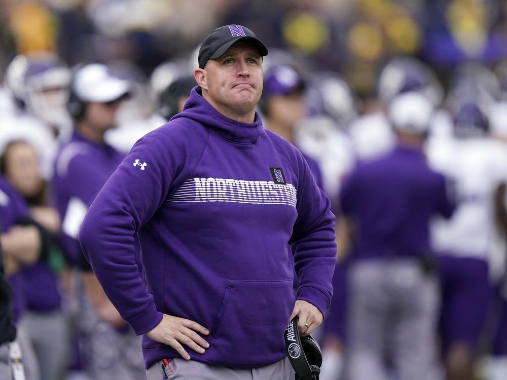 Then-Northwestern head coach Pat Fitzgerald stands on the sideline during a game against Michigan on Oct. 23, 2021, in Ann Arbor, Mich.