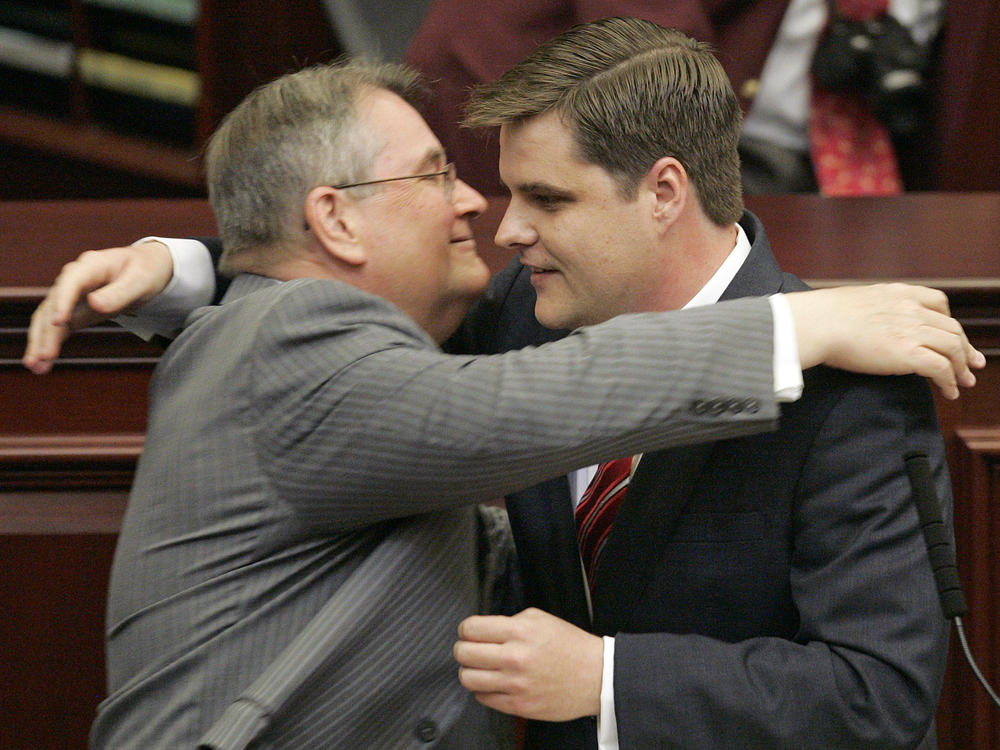 In this file photo, former Florida state Sen. Don Gaetz, R, left, hugs his son, former state Rep. Matt Gaetz, R, after he was sworn in as the newest member of the house on April 15, 2010, in Tallahassee, Fla.