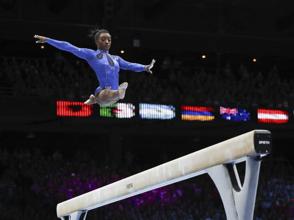 Simone Biles competes on the beam during the women's all-round final at the Artistic Gymnastics World Championships in Antwerp, Belgium, on Friday.