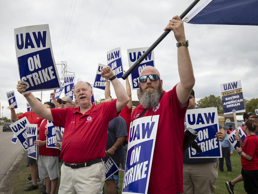 UAW members strike at the General Motors Lansing Delta Assembly Plant in Lansing, Mich., on Sept. 29, 2023. Fain is leaning hard on class rhetoric as he fights with the Big Three automakers over a new contract.