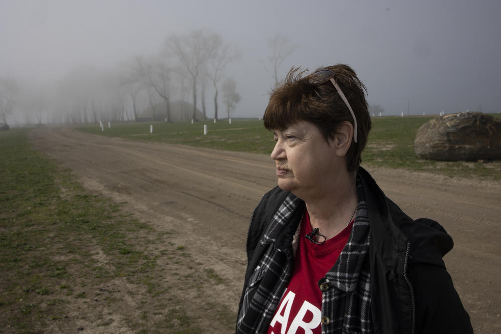 Susan Hurlburt visits her son's grave on Hart Island for the first time in April 2023.