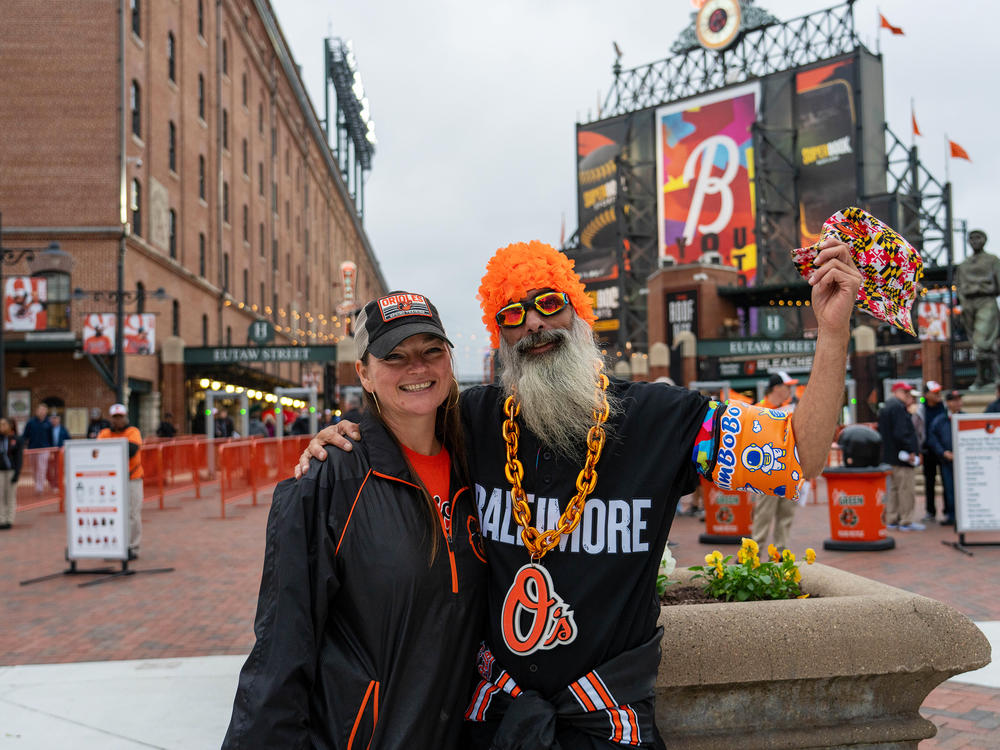 Claire Sanford and Chad Richhart have been coming to see the Baltimore Orioles since 1992. They came dressed for the bird bath, a splash zone seating area for fans at Camden Yards.