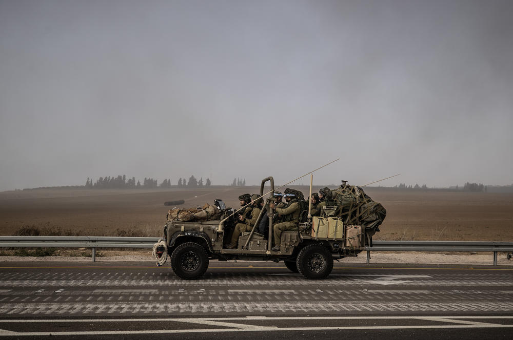 Sun., Oct. 8: Trucks carry heavy armored vehicles and tanks of Israeli army as Israel tightens measures by the army, police and other security forces.