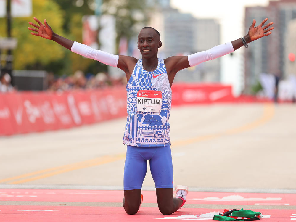 Kelvin Kiptum of Kenya celebrates after winning the 2023 Chicago Marathon professional men's division and setting a world record marathon time of 2:00.35 at Grant Park on Sunday in Chicago, Illinois.