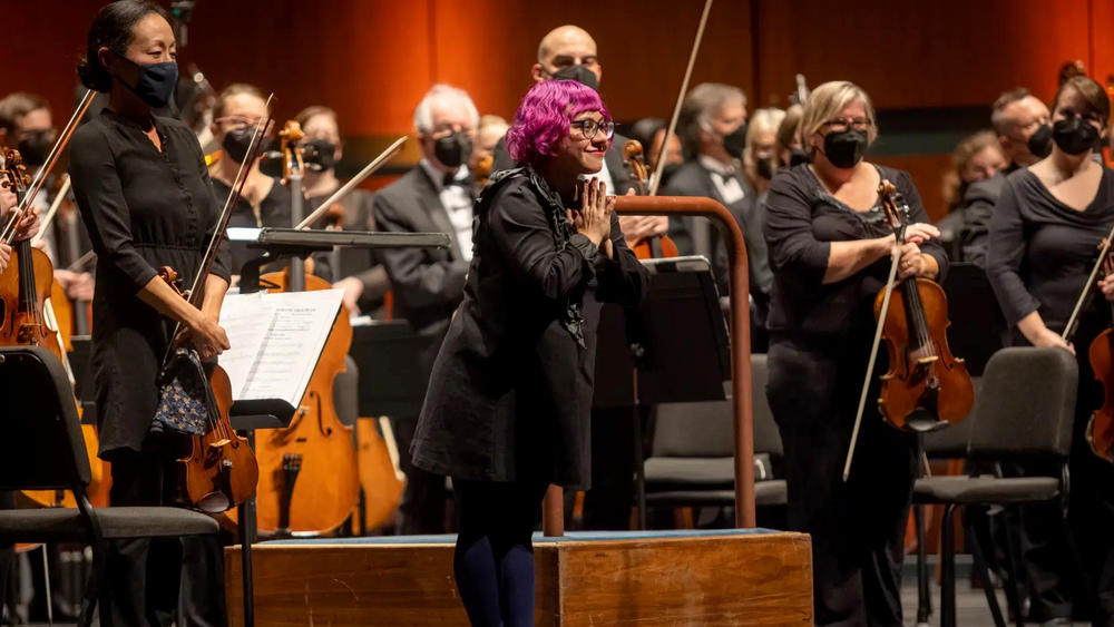 Negrón accepts applause after the world premiere of <em>Sinfonía Isleña</em>, performed by the Eugene Symphony on Feb. 16, 2023.
