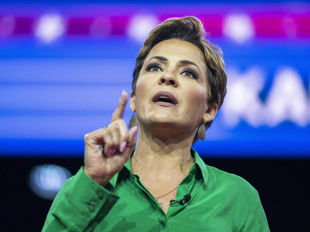 In this file photo, Kari Lake speaks at the Conservative Political Action Conference, March 4, at National Harbor in Oxon Hill, Md.