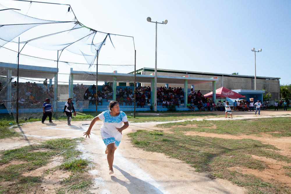 Berenice Geraldine Cime Ay is one of the youngest players on the Amazonas of Yaxunah. Above, the 14-year-old runs to first base.
