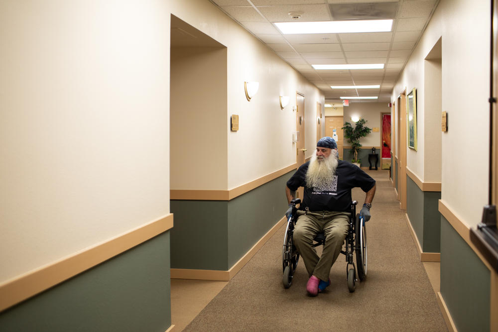 Norris lost his feet because of his diabetes. On a brief tour of his new apartment building, he pointed out the gym and joked, 