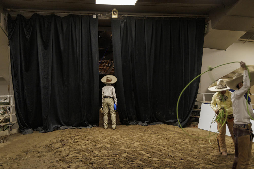 Young ropers wait backstage before their performance at the Mexican Rodeo Extravaganza.