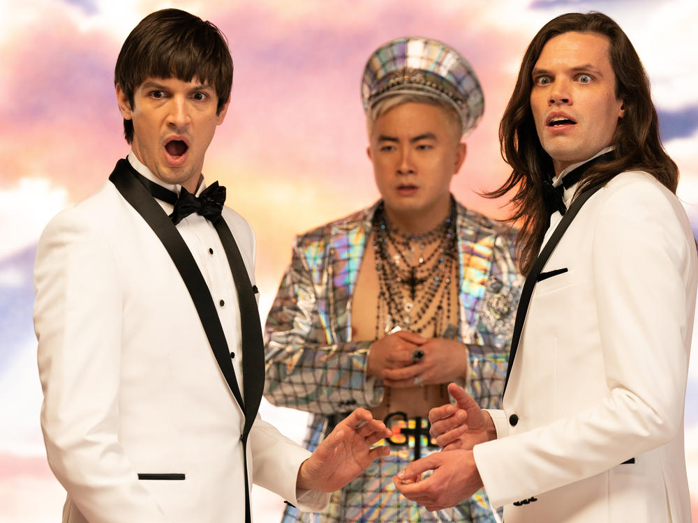 Craig (Josh Sharp), God (Bowen Yang) and Trevor (Aaron Jackson) are gooped, gagged and gobsmacked in <em>Dicks: The Musical.</em>