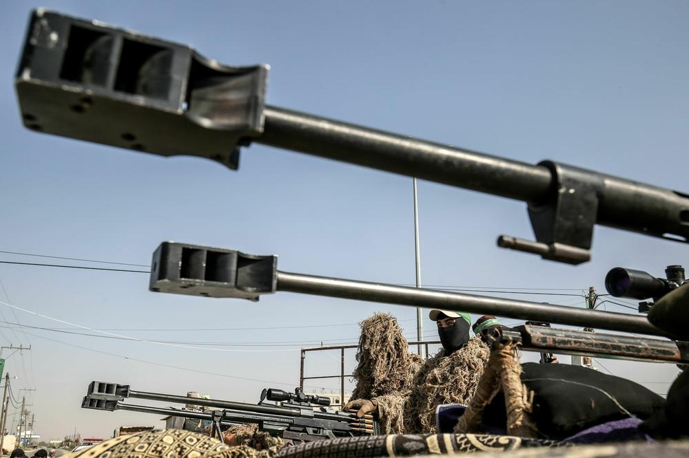 A fighter from the Qassam Brigades, the armed wing of the Hamas movement, is pictured amid long-range 50-caliber sniper rifles during an anti-Israel military show in Khan Yunis, in the southern Gaza Strip, on Nov. 11, 2019.