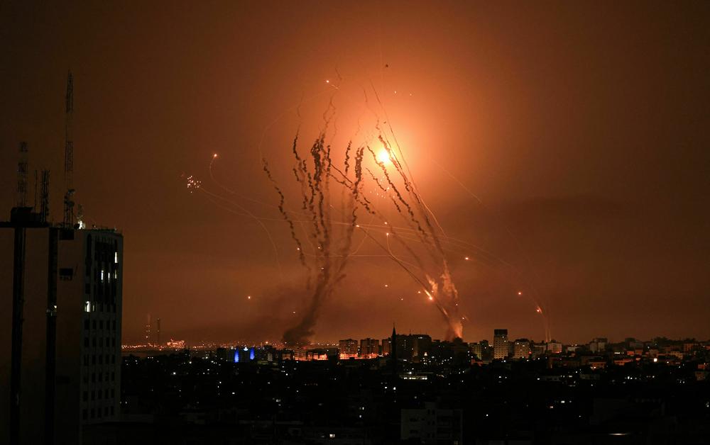 Israeli missiles are launched from the Iron Dome defense system as a salvo of rockets is fired from the Gaza Strip on Oct. 8.