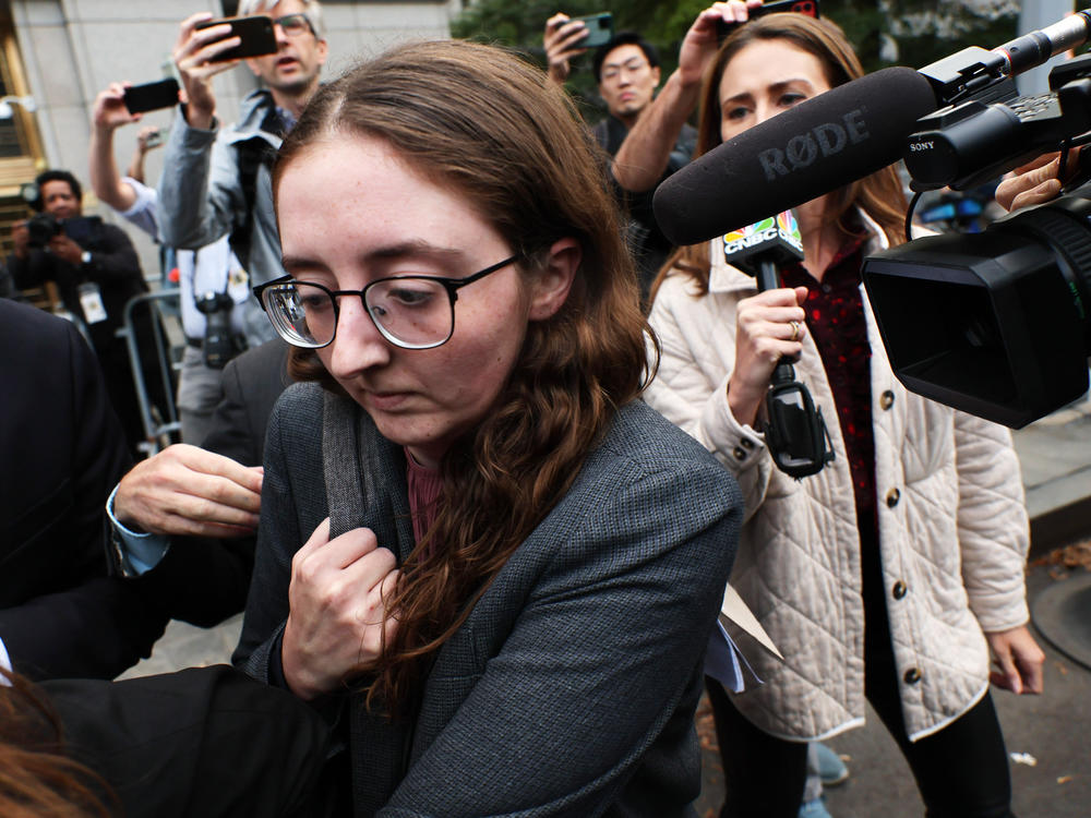 Caroline Ellison leaves federal court in Manhattan after testifying during the trial of former FTX CEO Sam Bankman-Fried on Oct. 10. Ellison said Bankman-Fried was the main decision-maker and steered her to transfer funds from cryptocurrency exchange FTX to Alameda Research, a financial firm she headed.