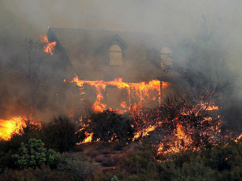 Many homes are destroyed in wildfires due to wind-driven embers that get caught in the landscaping. California is now drafting rules that would limit vegetation within five feet of a house.