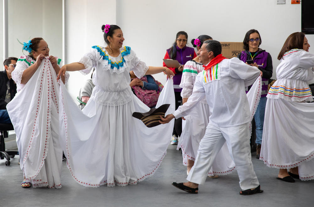 Ruth Infante, 42 (second from left), has been coming to Colombia's groundbreaking program for caregivers for a year. 