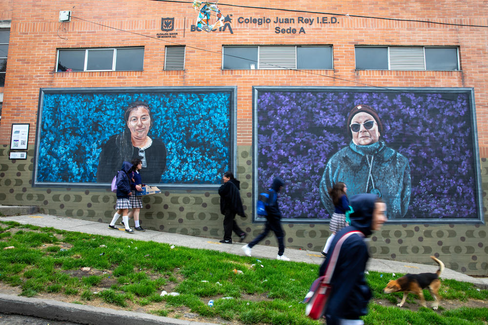 <em>Manzanas del Cuidado, </em>the program for caregivers, commissioned murals of Ruth Infante (left) and Rita Salamanca in recognition of the important role they play as caregivers in the community. The murals are displayed on a school in the center of San Cristobal.