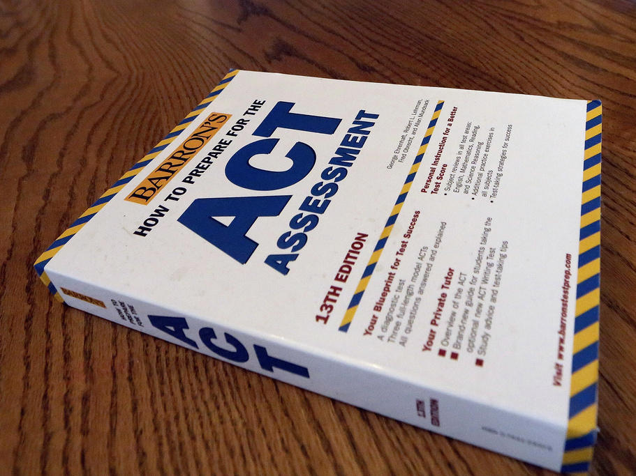 An ACT Assessment preparation book is seen in 2014 in Springfield, Ill. High school students' scores on the ACT college admissions test for 2023 dropped to their lowest in more than three decades, showing a lack of student preparedness for college-level coursework, the nonprofit organization that administers the test said Wednesday.