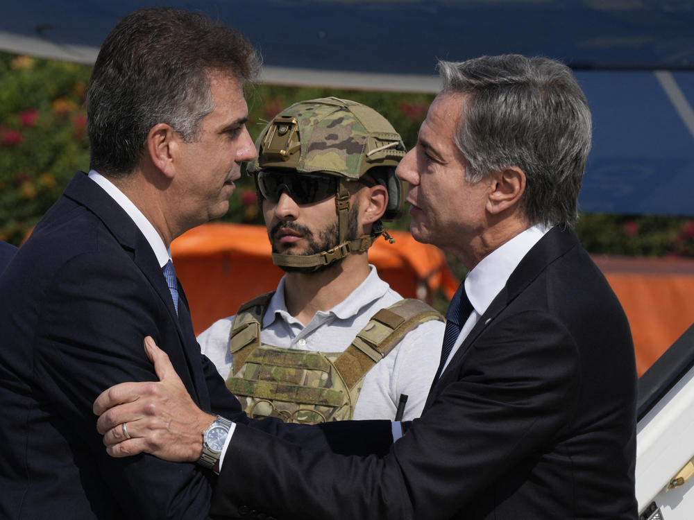 Israel's Foreign Minister Eli Cohen, left, welcomes U.S. Secretary of State Antony Blinken upon arrival at Israel's Ben Gurion Airport in Lod, on the outskirts of Tel Aviv, on Thursday.