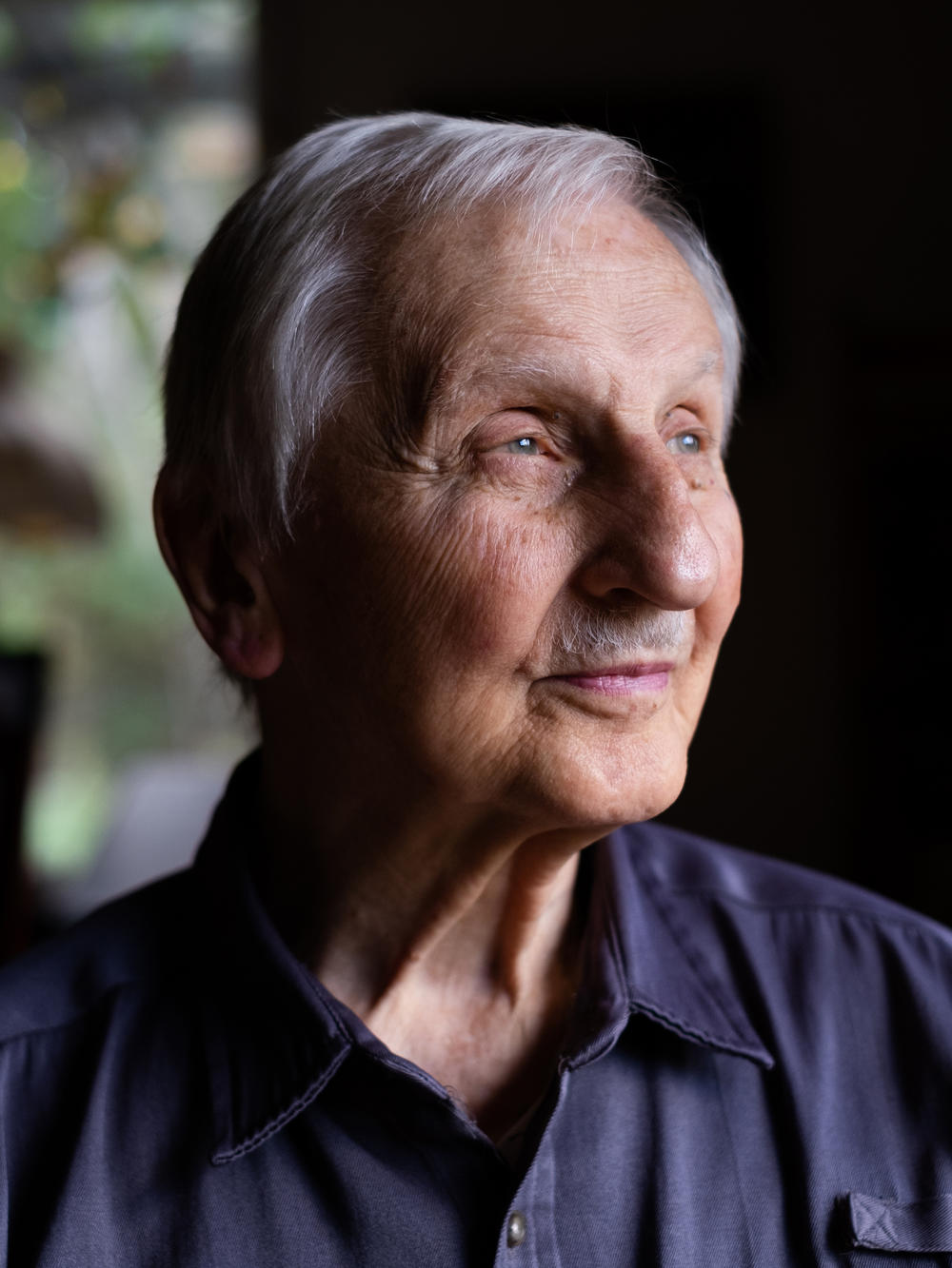 Dr. Carl Shy in his home.