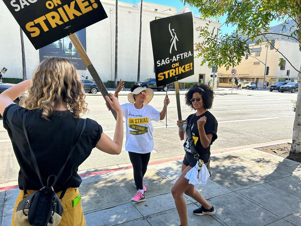 Actress Gabrielle Maiden and fellow SAG-AFTRA members picket outside Universal Studios.