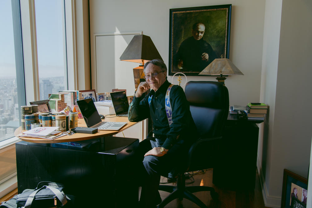 Ray Kurzweil poses for a portrait with a painting of his father, Fredric Kurzweil.