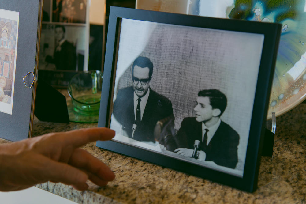 Ray Kurzweil points to a photograph of himself with 