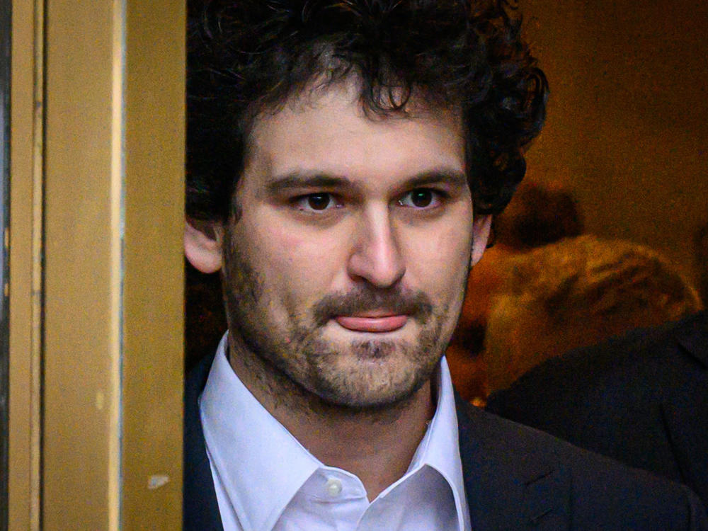 FTX founder Sam Bankman-Fried leaves the courthouse following his arraignment in New York City on Dec. 22, 2022. Bankman-Fried's trial just concluded its second week, with explosive testimony from former girlfriend Caroline Ellison.