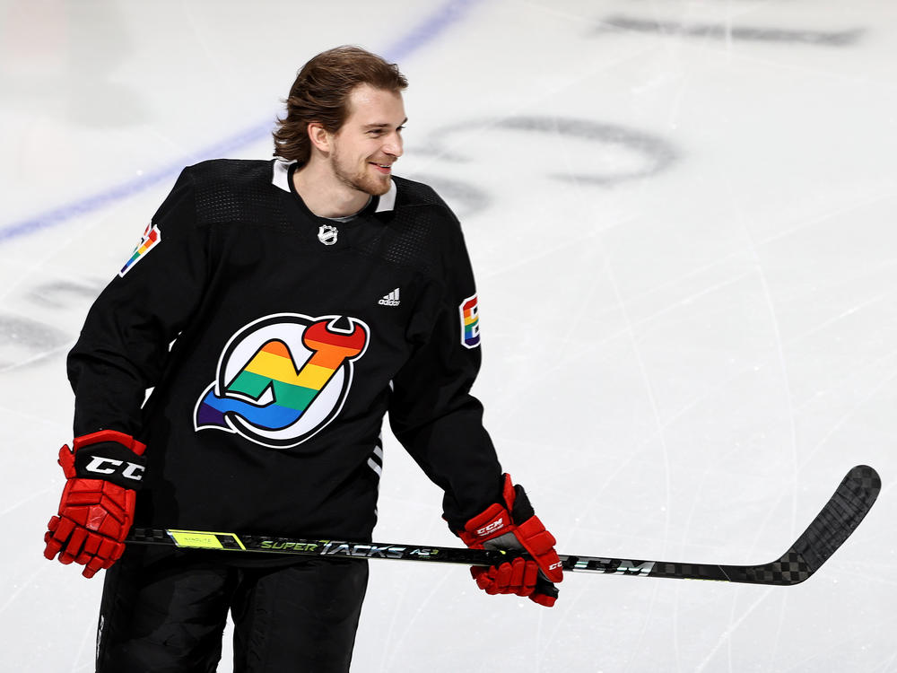 Marian Studenic of the New Jersey Devils takes the ice in 2021, when Devils wore special jerseys during warmups to celebrate Pride Night.