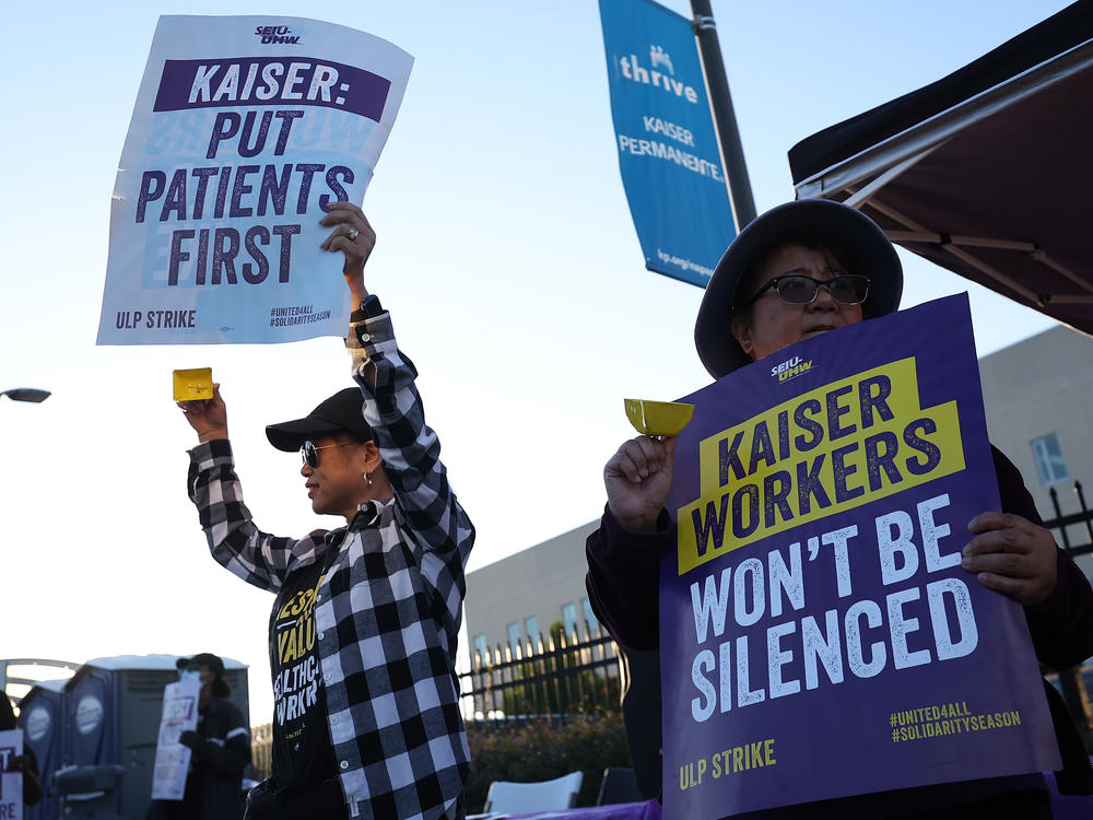 Striking Kaiser Permanente workers on the picket line in front of a hospital in Vallejo, Calif., on Oct. 6. A deal to avert another strike came together Friday.