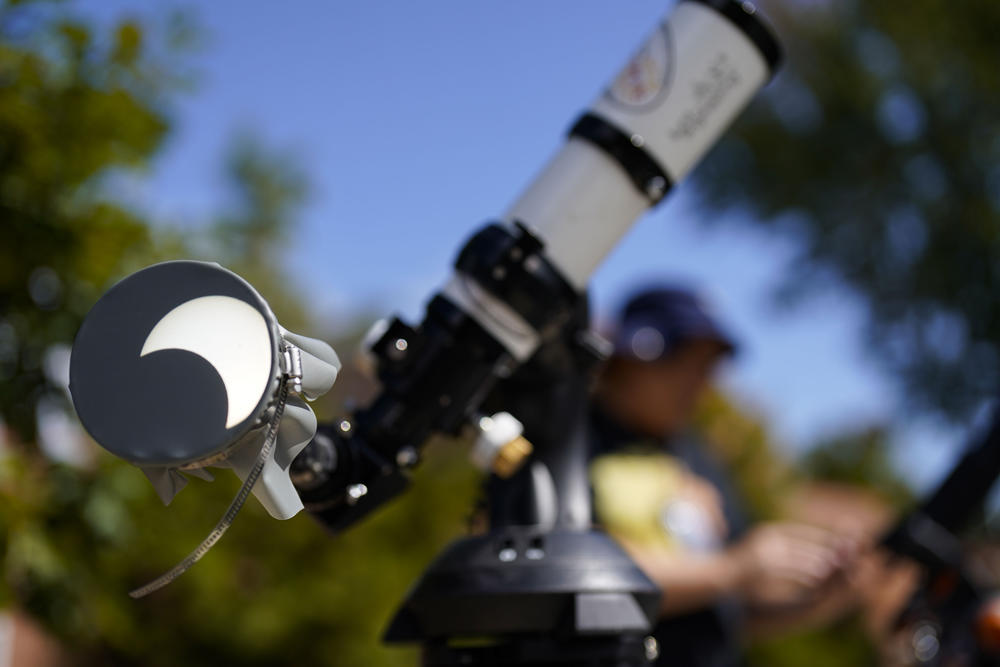 A partial solar eclipse is seen on a telescope on Saturday in Marietta, Ga.