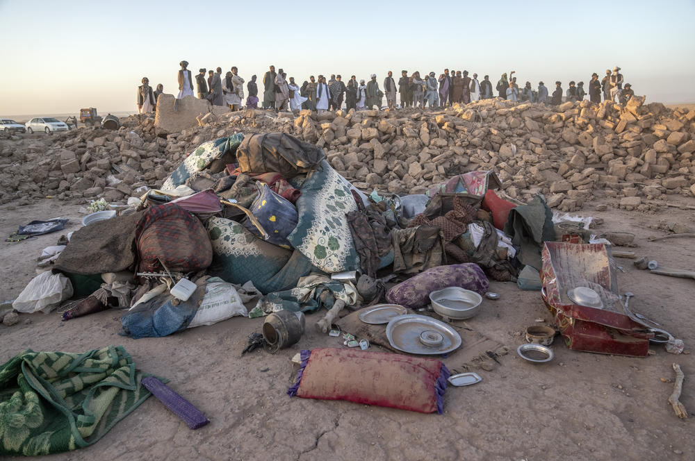Sun., Oct. 8: Afghan men search for victims after an earthquake in Zenda Jan district in Herat province.