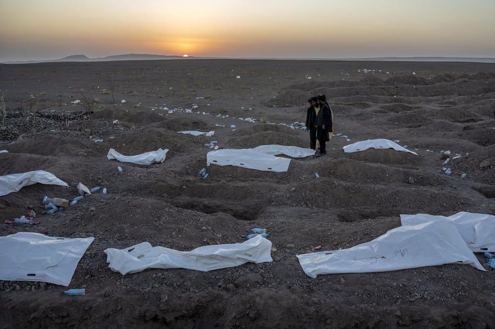 Mon., Oct. 9: Afghans bury hundreds of people killed in an earthquake to a burial site, outside a village in Zenda Jan district in Herat.