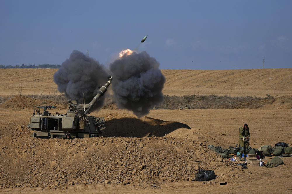 Sun., Oct 15: An Israeli mobile artillery unit fires a shell from southern Israel towards the Gaza Strip, in a position near the Israel-Gaza border.