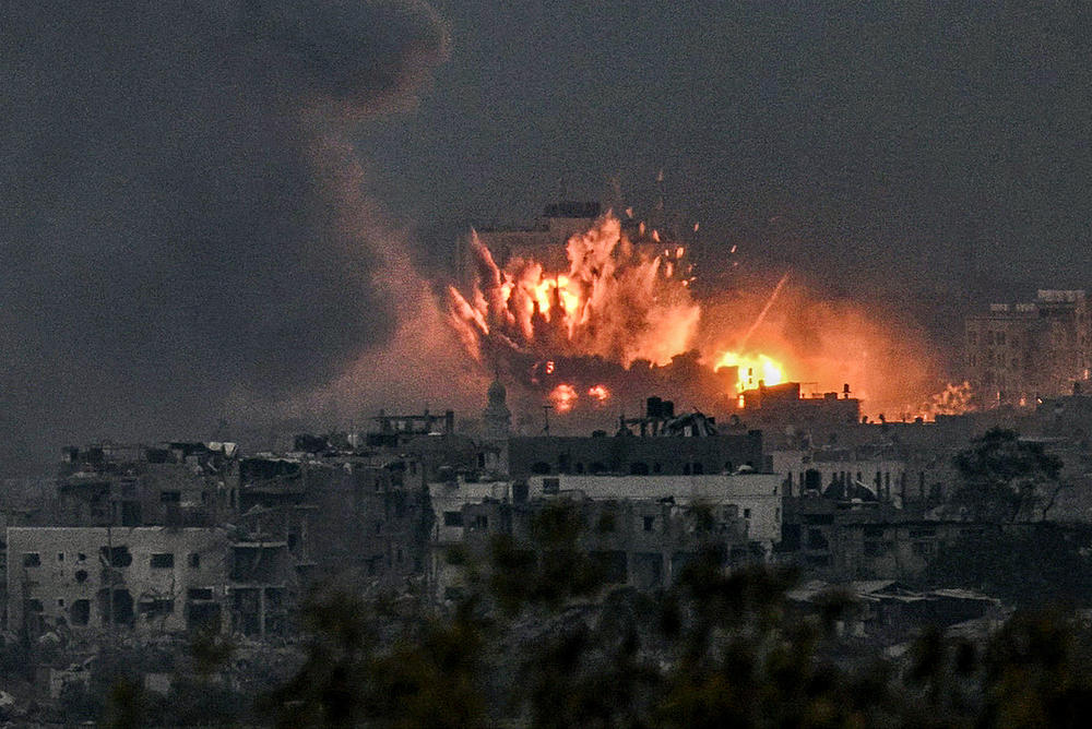 Sat., Oct. 14: A fireball erupts during Israeli bombardment in the northern Gaza Strip.