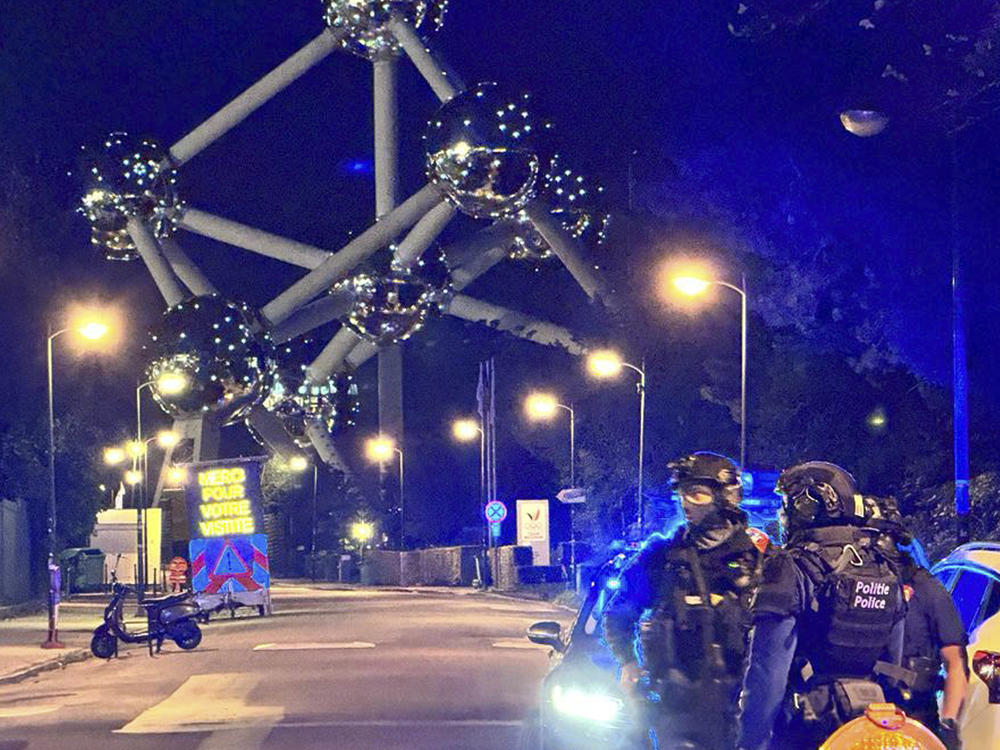 Police patrol outside the King Baudouin Stadium, after a match between Belgium and Sweden was suspended, after a shooting in the center of Brussels, Monday, Oct. 16, 2023.