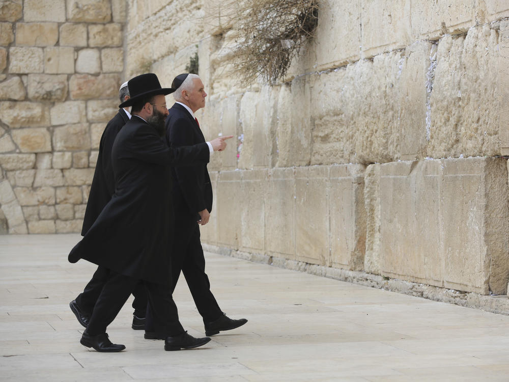 Then-U.S. Vice President Mike Pence visits the Western Wall escorted by the Rabbi Shmuel Rabinovitch in Jerusalem's Old City in Jan. 2018.