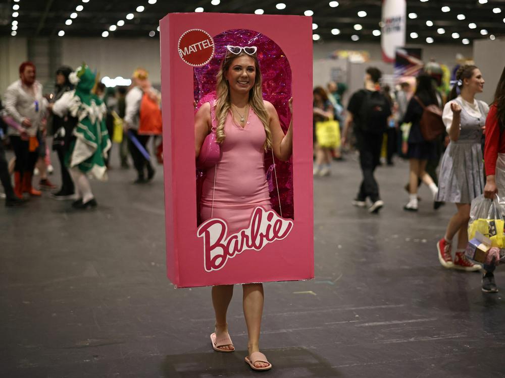 A cosplayer dressed as a boxed Barbie doll attends the MCM Comic Con at ExCeL exhibition centre in London on May 26, 2023.