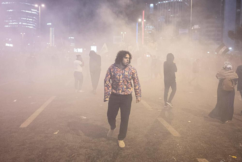 Weds., Oct. 18: People clash with anti-riot policemen outside the Israeli consulate during a protest to show solidarity with Palestinians, in Istanbul.