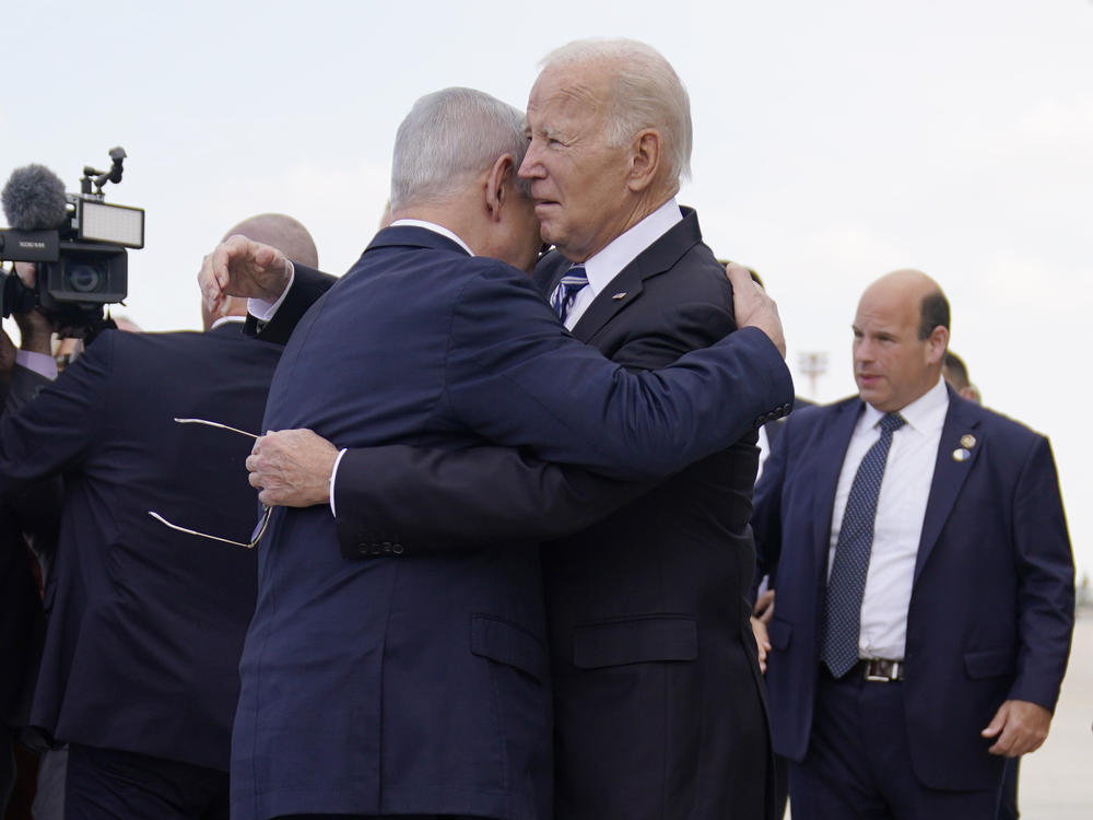 President Biden greets Israeli Prime Minister Benjamin Netanyahu at Ben Gurion International Airport on Wednesday, Oct. 18, 2023, in Tel Aviv.