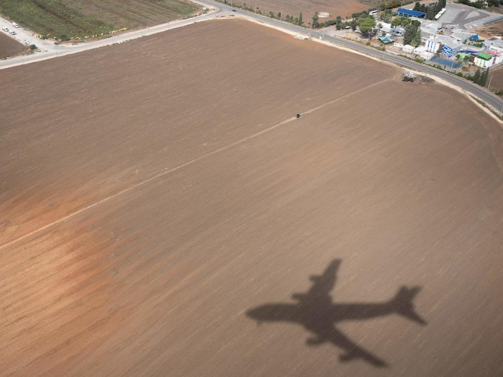 The shadow of Air Force One as seen before President Biden landed at Ben Gurion Airport in Tel Aviv on Oct. 18, 2023.