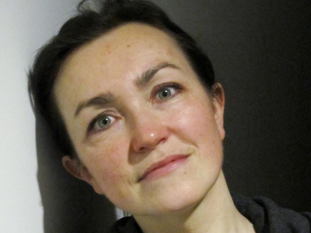 In this handout, Radio Free Europe-Radio Liberty editor Alsu Kurmasheva poses for a photo during a work break in Prague, Czech Republic, on March 6, 2013.