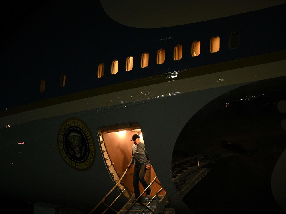 President Biden steps off Air Force One on Oct. 19 after a 30-hour trip to Israel and back. Biden is set to deliver a primetime address on Thursday evening.