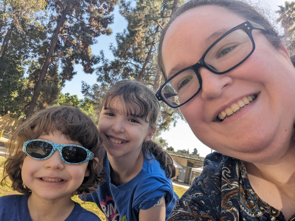 Anne Hamilton captures the moment outside a pop-up vaccine clinic in a park in Los Angeles, with two of her children, 11-year-old Katie and 4-year-old Jimmy. Hamilton spent 16 days searching for a vaccine for Jimmy, who needed the formulation for children under 5. She eventually found the shot at this temporary clinic run by the L.A. County Dept. of Public Health.