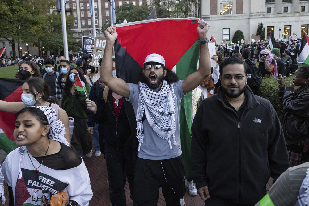 Palestinian supporters chant as they march during a protest at Columbia University on October 12.