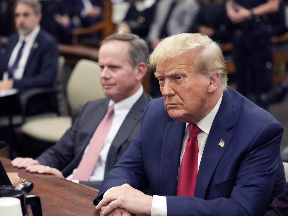 Former President Donald Trump sits in the courtroom with his legal team before the continuation of his civil business fraud trial at New York Supreme Court, Tuesday, Oct. 17, 2023, in New York.