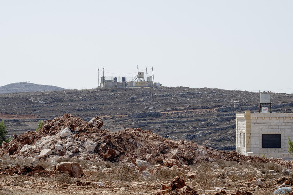 A view of Qusra with the Israeli settlement of Esh Kodesh in the distance.