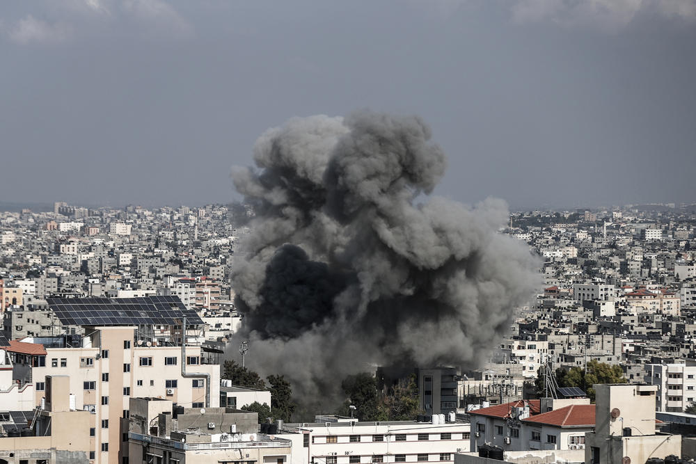 Black smoke rises after an Israeli airstrike on the eighth day of the clashes in Gaza Strip, Gaza on October 14, 2023.