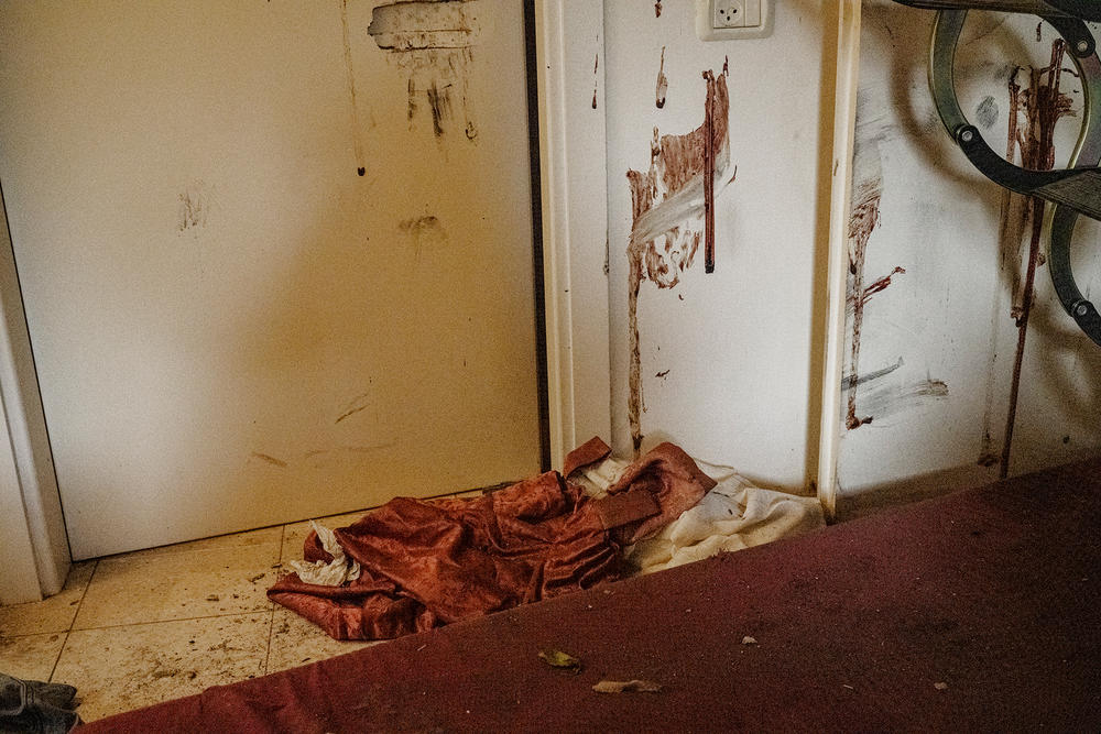 Blood is splattered across the walls of many homes, where people attempted to hide in bathrooms or bedrooms.