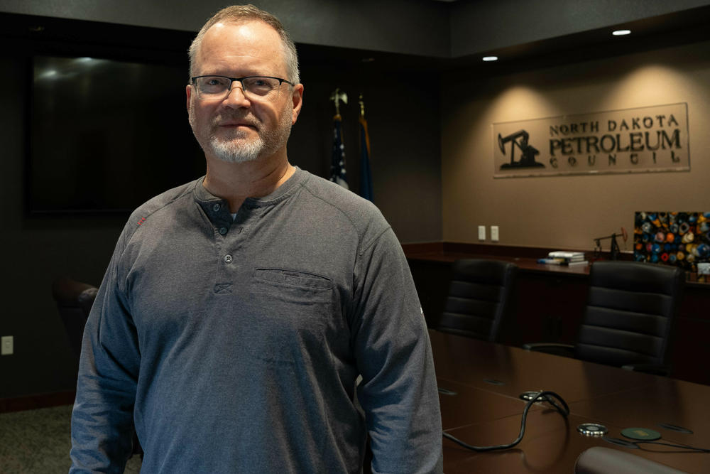 Former Lt. Gov. Brent Sanford, pictured in his office in Bismarck, now works for North Dakota's petroleum industry. He's trying to find workers to fill jobs in the Bakken oil fields in the western part of the state.