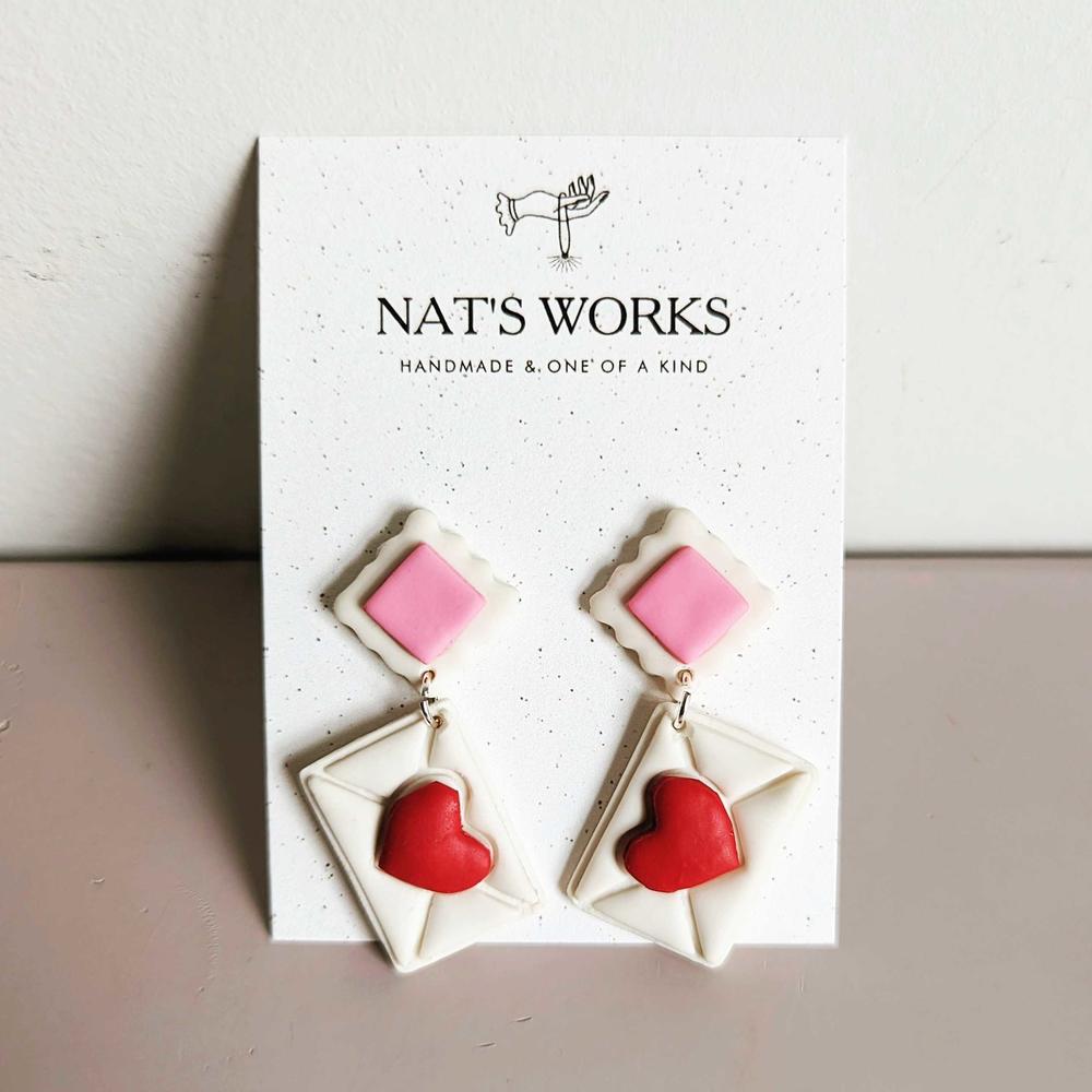 Love letter earrings.